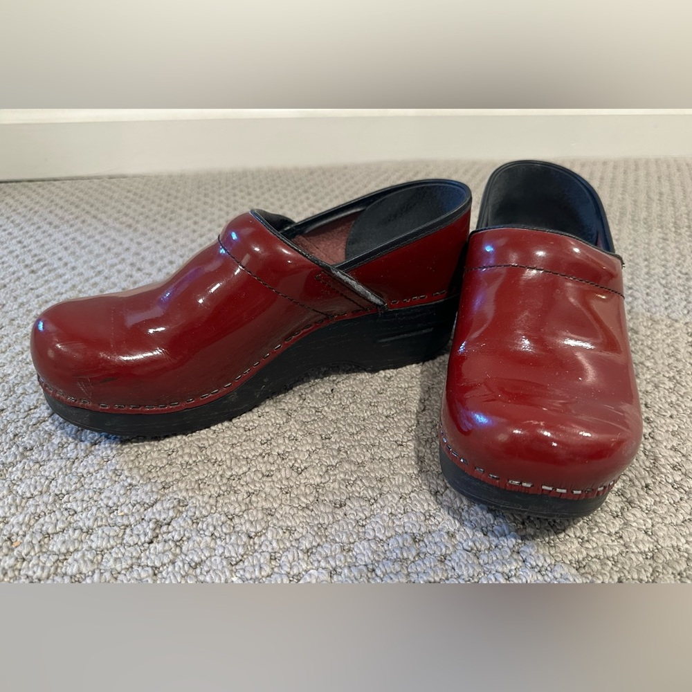 Classic Dansko women’s red patent clogs. Style “Professional”.